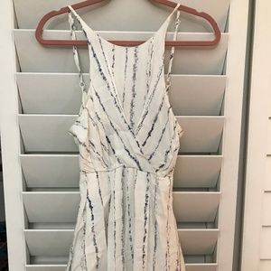 White striped romper with open back